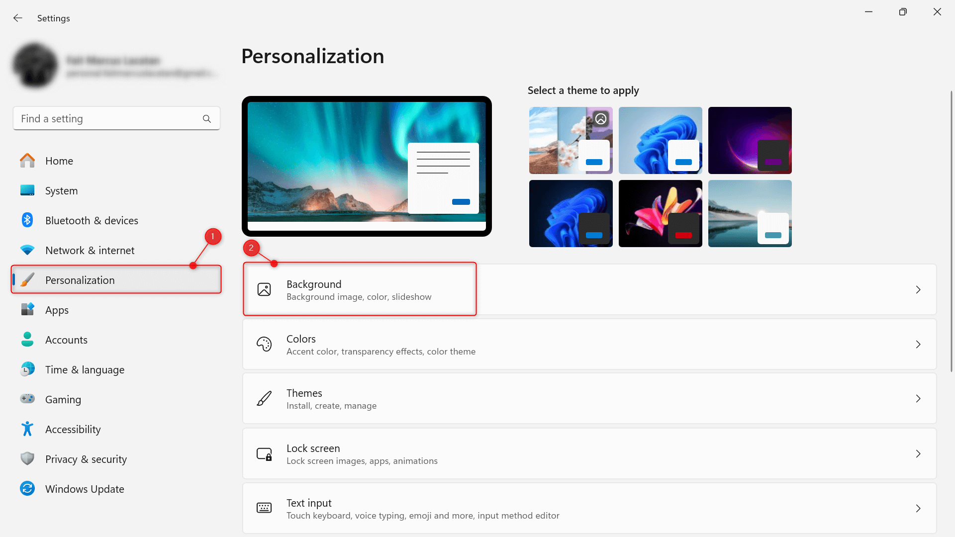 Personalization > Background highlighted in Windows 11's Settings app.