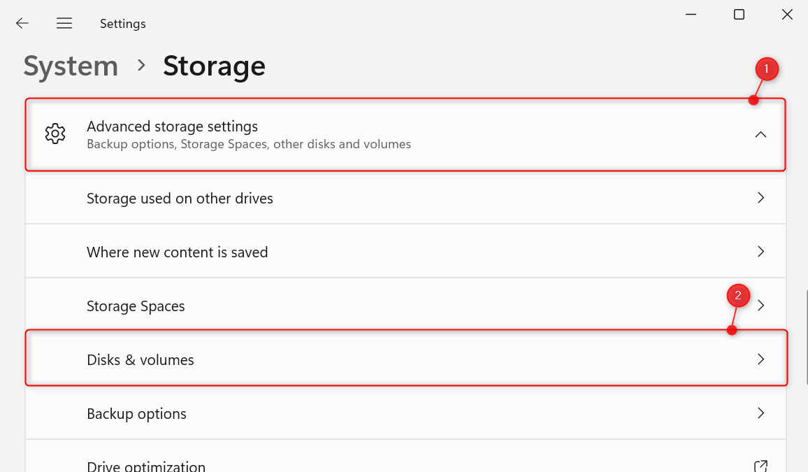 "Advanced storage settings" and "Disks & volumes" highlighted in Windows 11 Settings.