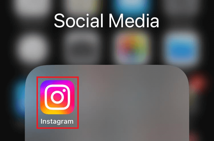 Instagram app highlighted in phone screen.