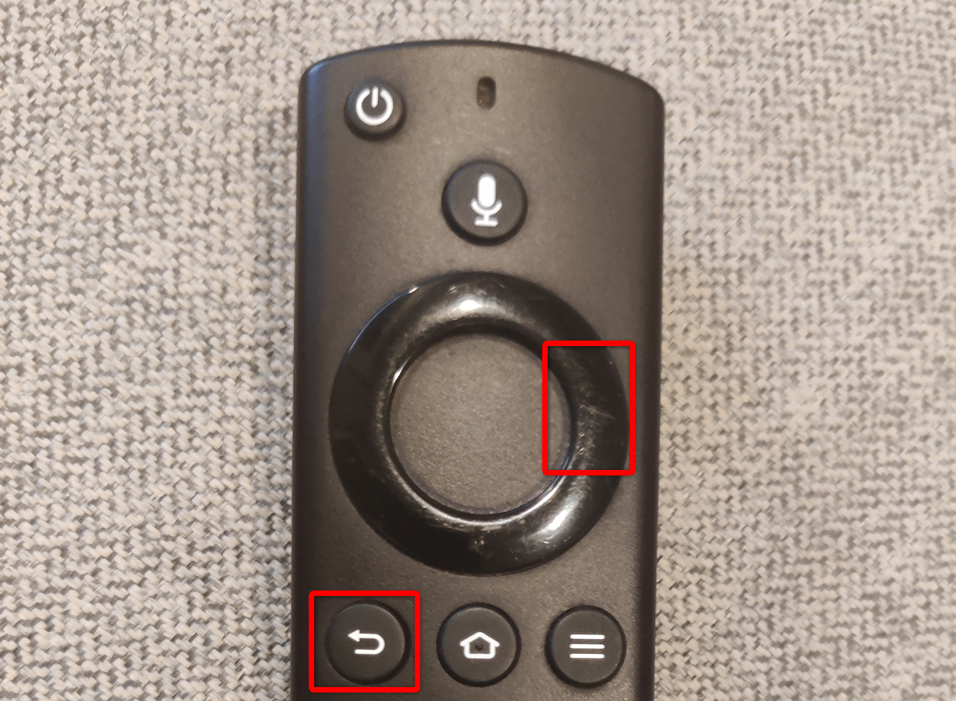 Right and Back buttons highlighted on a Fire TV Stick remote.