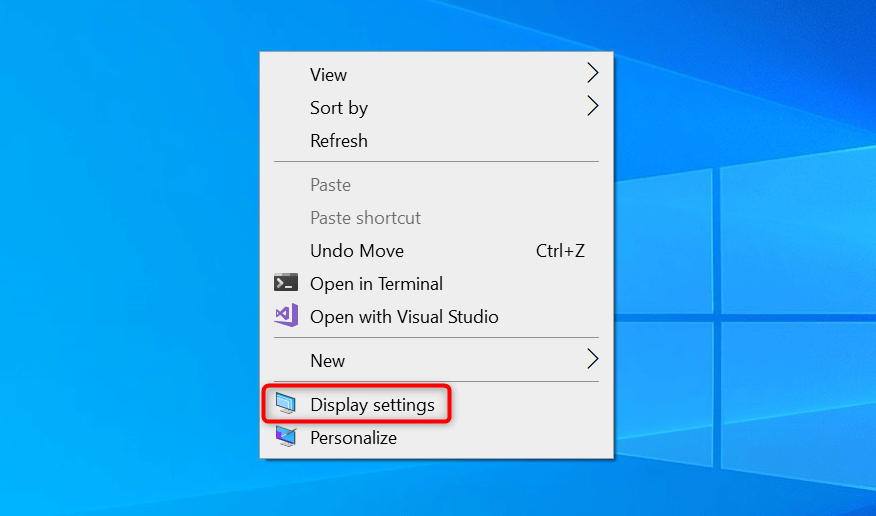 "Display settings" highlighted in Windows 10 desktop's context menu.