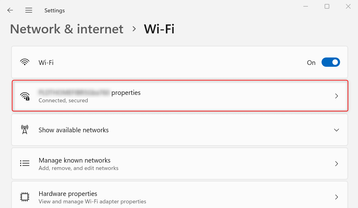 Current Wi-Fi network properties highlighted in Windows 11 settings.