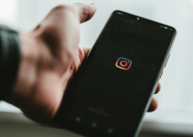 Instagram's logo displayed on a mobile phone.