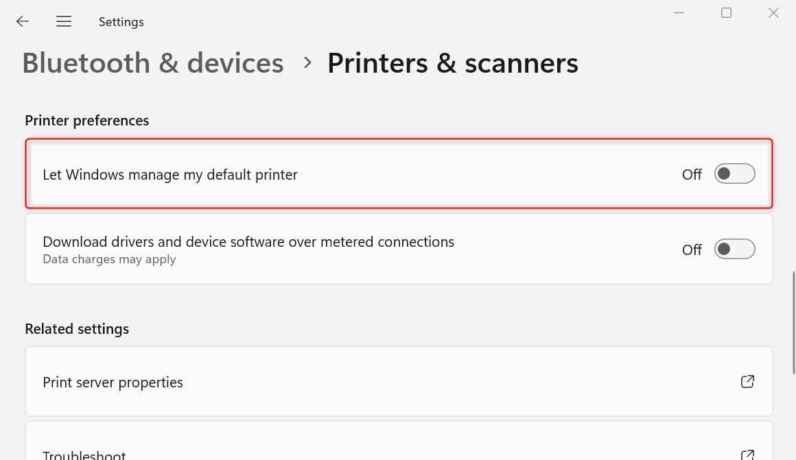 "Let Windows manage my default printer" option highlighted in Printer preferences.
