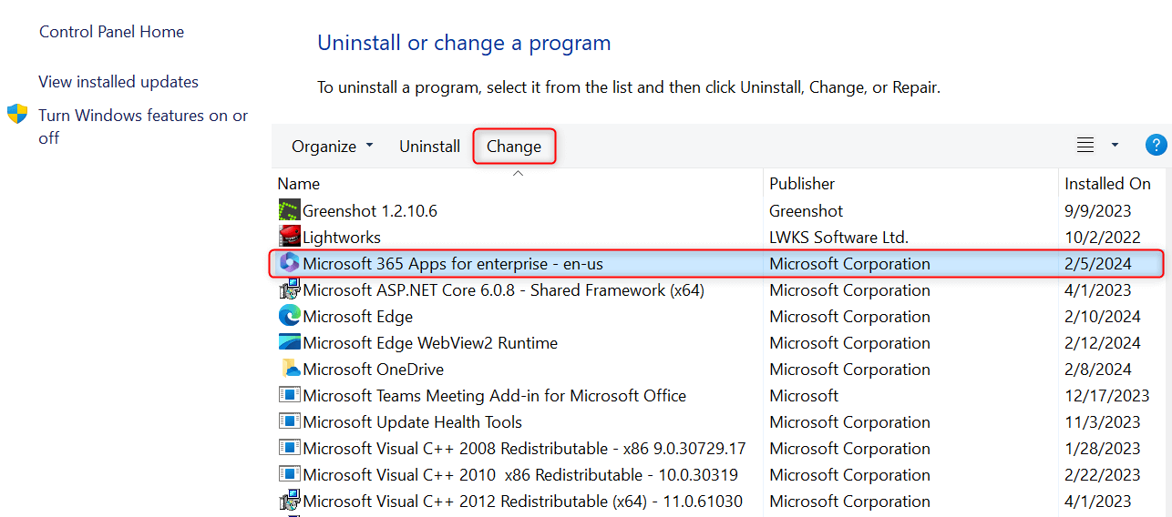"Change" button highlighted in "Uninstall or change a program" section in Control Panel.