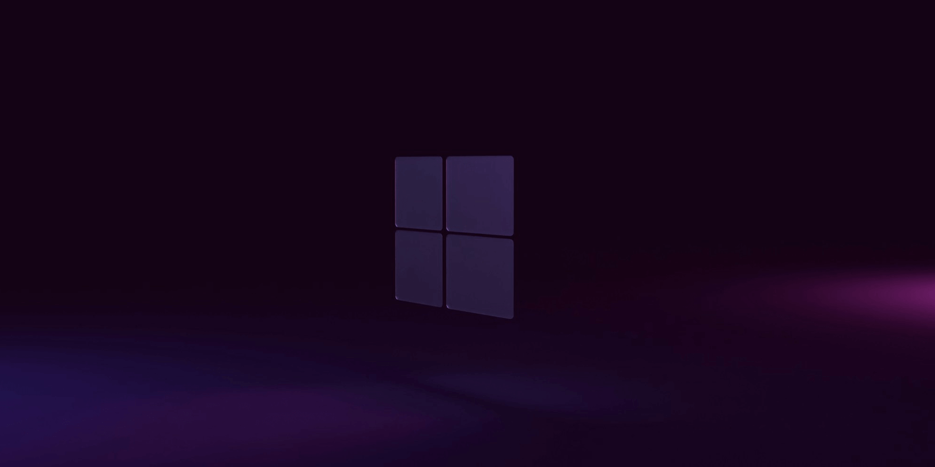 Microsoft Windows logo on dark background.