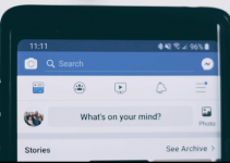 Facebook's "What's on your mind?" option open on a phone.