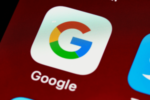 The Google app icon on a smartphone.